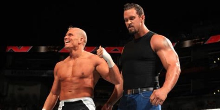 Tyson Kidd and that HUGE dude (Jackson Andrews)
